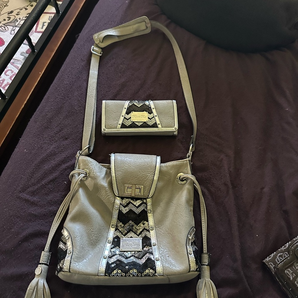 Miss Me shoulder bag and wallet set. Bag is a little worn . Wallet is brand new
